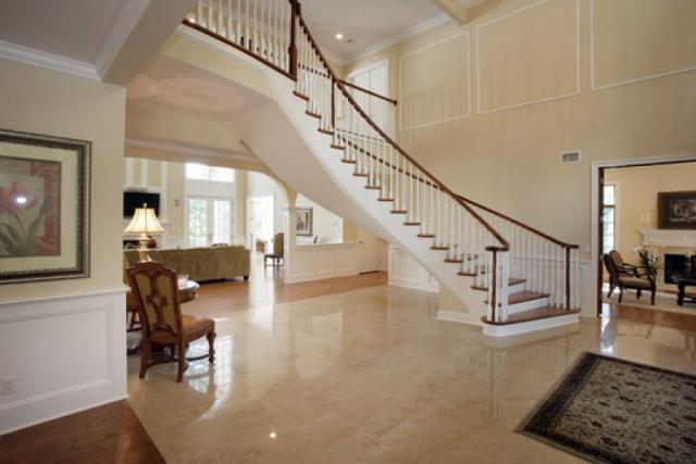 Featured image of post Marble Double Staircase Entrance - Leaded glass windows complement a staircase landing for a staircase boasting white spindles, a black handrail, and stained wood treads.